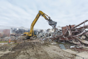 Crews begin exterior demolition of the facility.