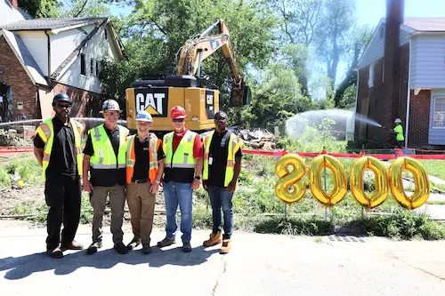 Adamo tears down 8000th house in detroit